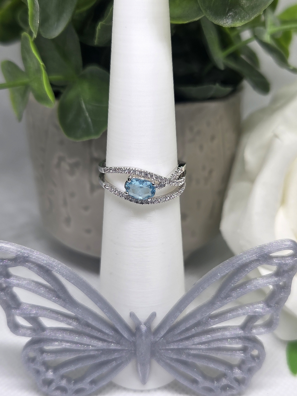 BP Blue Topaz and Cubic Zirconia Split Shank Ring On Rhodium Plating
